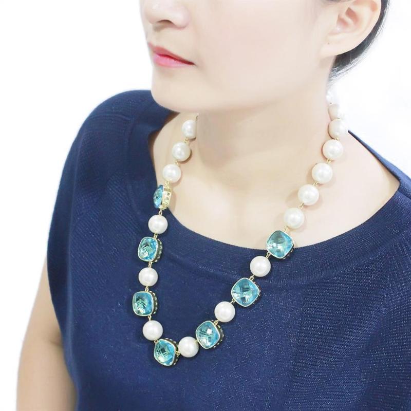 Gold Brass Necklace with Synthetic Synthetic Glass in Sea Blue